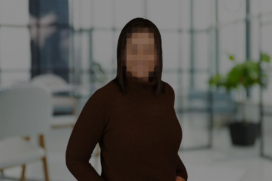 A headshot with a blurred face.
