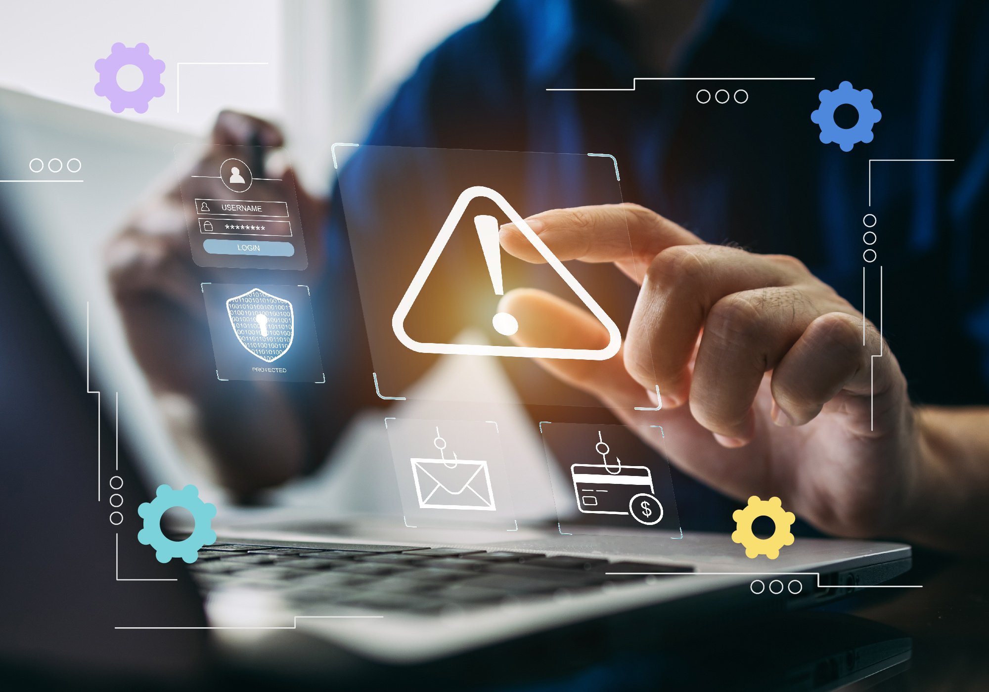 Hands hovering above a laptop with graphics projected above the keyboard.