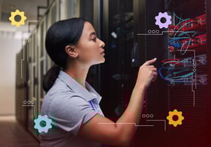 A person in a server room with gear icons.